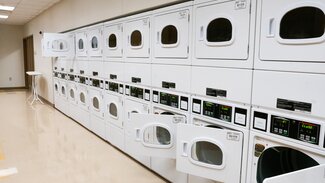 Bousfield laundry room with stacked dryers