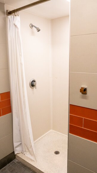 Single occupancy restroom with shower