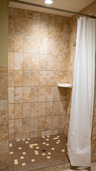 Large shower with curtain