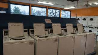 Laundry room with washers and dryers