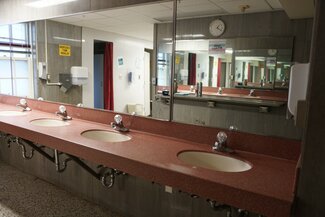 LAR communal bathroom with sinks and large mirror